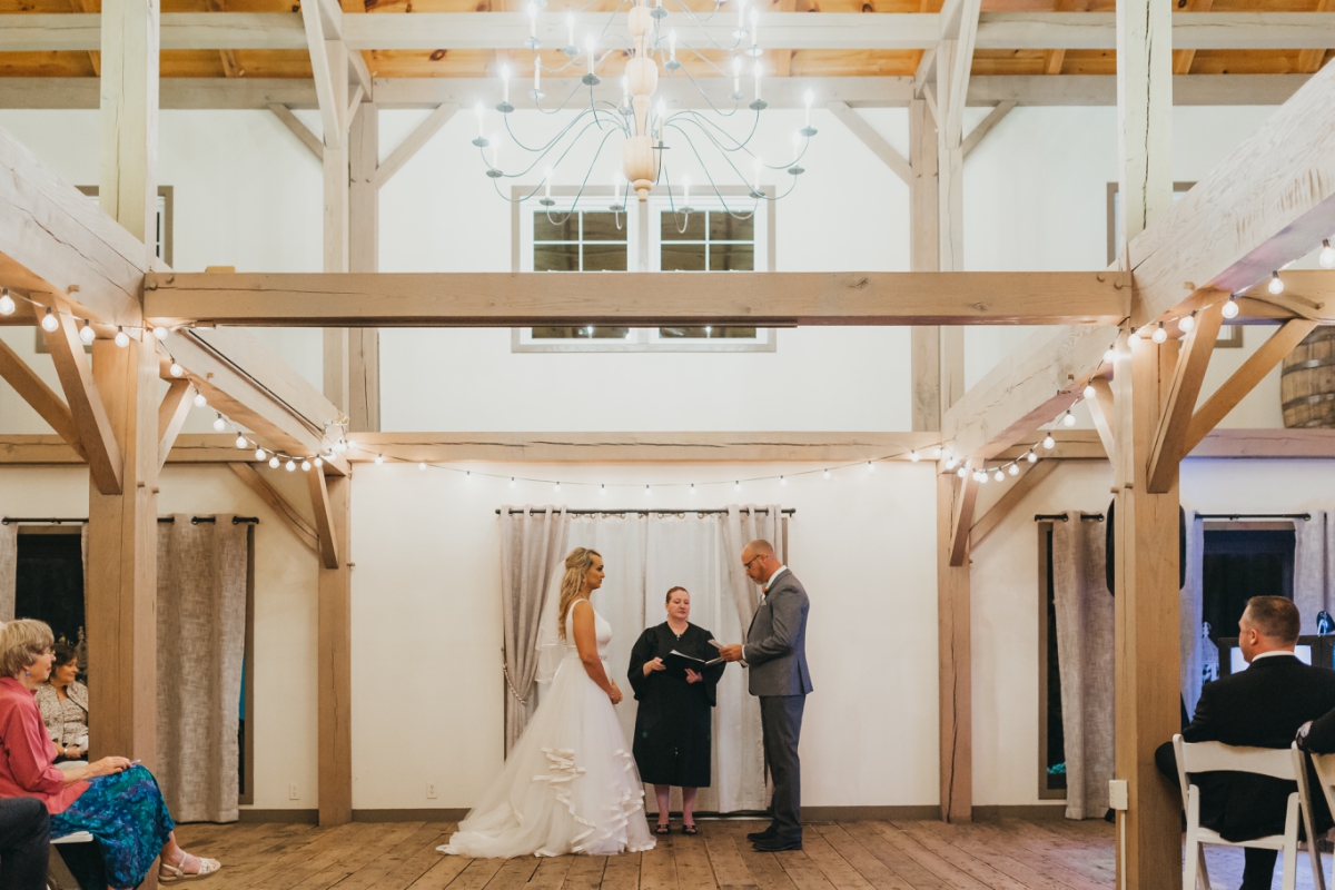 Indoor wedding ceremony at The Barn at Wight Farm
