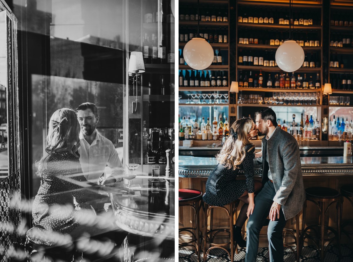 A couple sitting together in an empty bar.