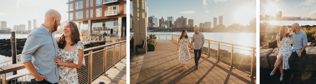 A couple walking with the sun and the Boston skyline behind them.